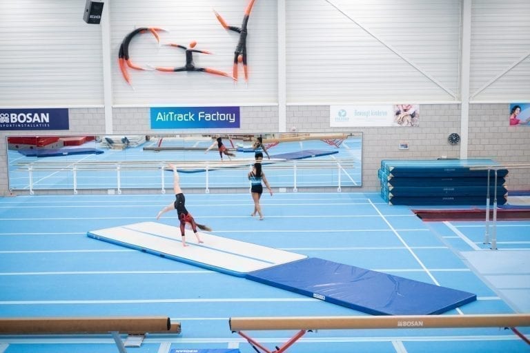Two gymnasts tumbling on a 6m AirTrack AirFloor