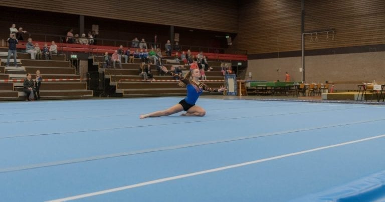 Gymnst performing on the AirTrack Competition Floor